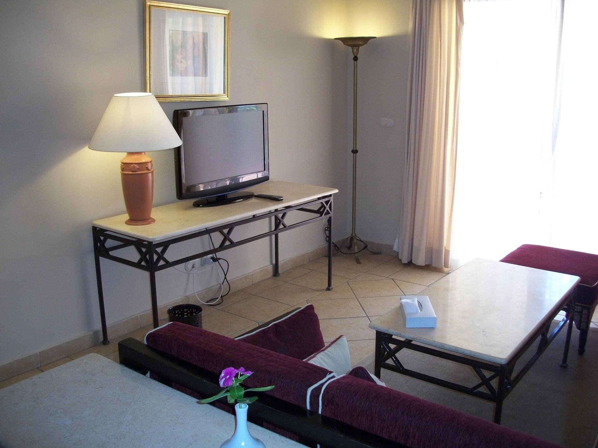 Jaz Makadi Saraya Resort Hurghada Exterior photo A living room in a typical hotel