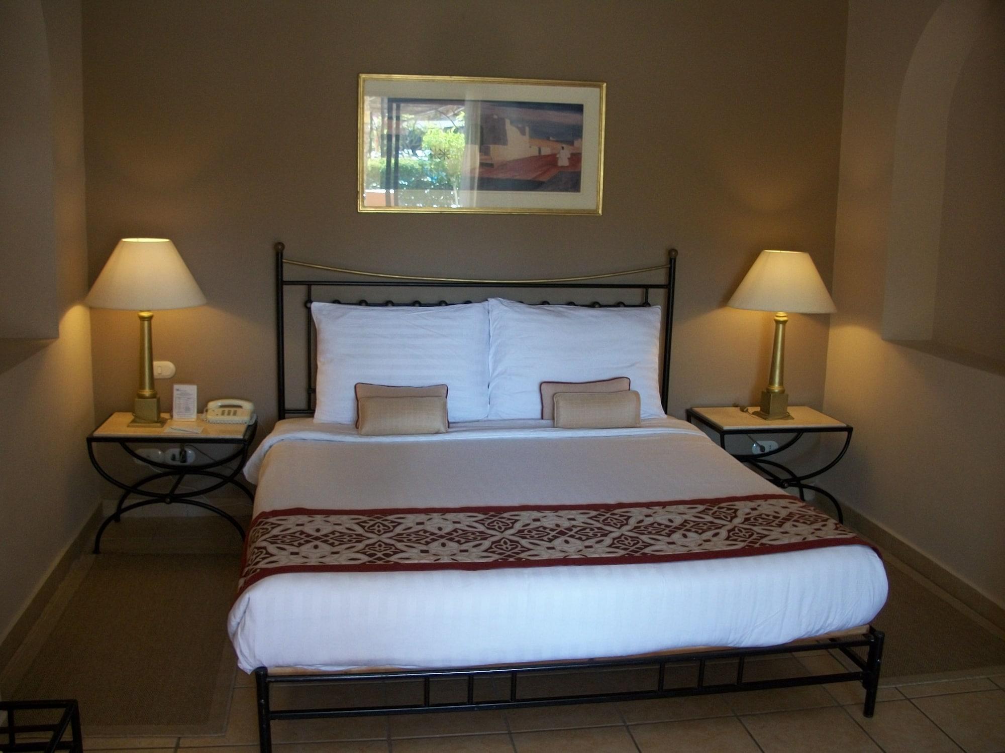 Jaz Makadi Saraya Resort Hurghada Exterior photo A bedroom at the Inn at the Opera